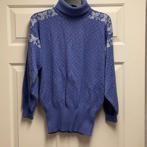 Purple turtleneck sweater with leaf pattern. Size M and excellent condition!